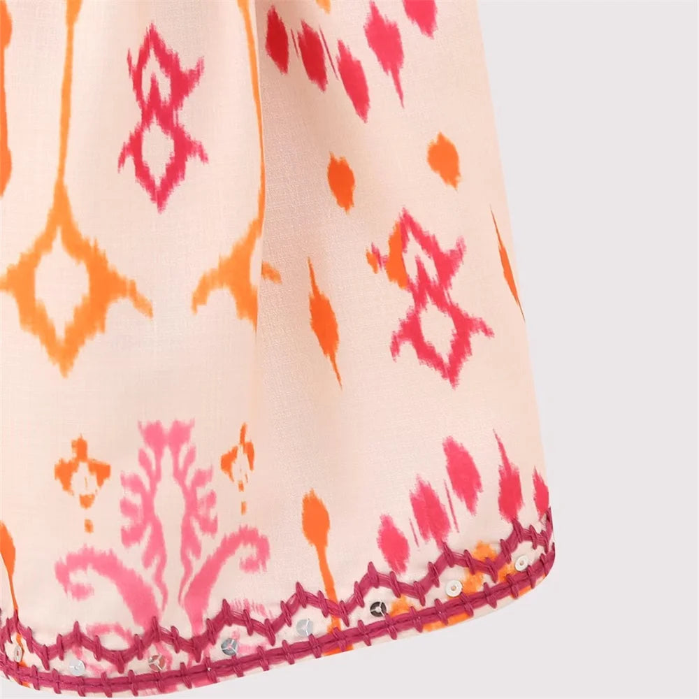 Unizera outono nova moda feminina versátil sexy com decote em v sem mangas bordado frisado impressão curto topo