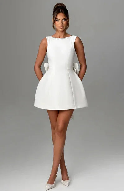 Elegante pérola arco sem costas vestido curto feminino o pescoço mini vestidos de noite preto branco rosa chique verão novo casamento convidado 2025