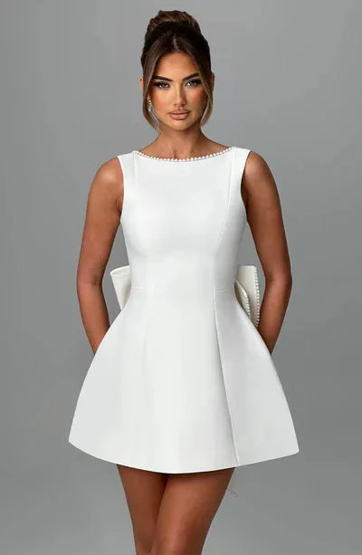 Elegante pérola arco sem costas vestido curto feminino o pescoço mini vestidos de noite preto branco rosa chique verão novo casamento convidado 2025