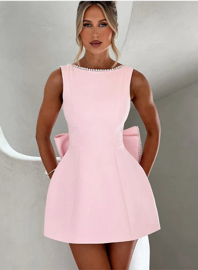 Elegante pérola arco sem costas vestido curto feminino o pescoço mini vestidos de noite preto branco rosa chique verão novo casamento convidado 2025