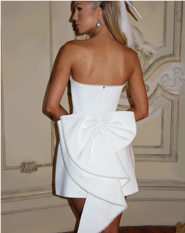 Elegante pérola arco sem costas vestido curto feminino o pescoço mini vestidos de noite preto branco rosa chique verão novo casamento convidado 2025