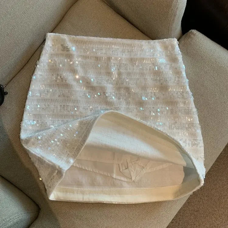 Saia francesa de lantejoulas cinza prateado feminina primavera e outono novo temperamento saia quadril tempero menina anti-exposição saia linha a
