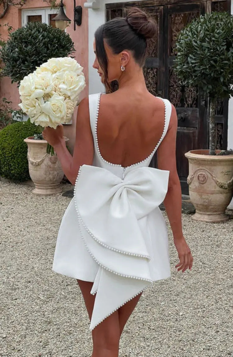 Elegante pérola arco sem costas vestido curto feminino o pescoço mini vestidos de noite preto branco rosa chique verão novo casamento convidado 2025