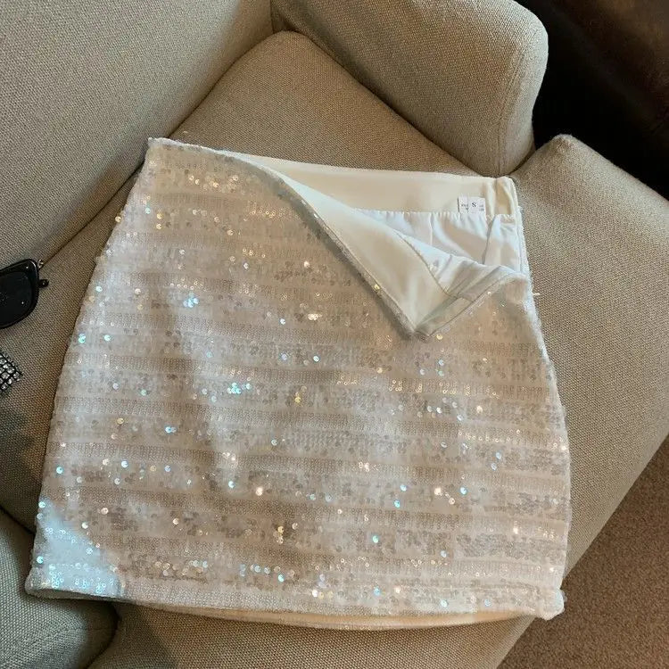 Saia francesa de lantejoulas cinza prateado feminina primavera e outono novo temperamento saia quadril tempero menina anti-exposição saia linha a